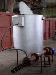 Бункер-ворошитель со шнековой подачей для системы отопления сушильной камеры.